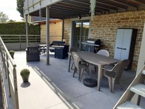 Uma varanda ou terraço em L’Ancienne Grange 1916
