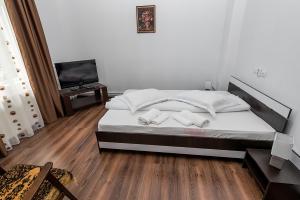 Postel nebo postele na pokoji v ubytování Casa Cristopher