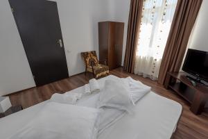 Postel nebo postele na pokoji v ubytování Casa Cristopher