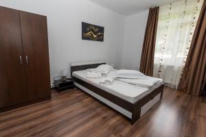 Postel nebo postele na pokoji v ubytování Casa Cristopher