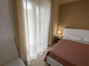 Postel nebo postele na pokoji v ubytování B&B Enjoy Happyness + 65 fotografií