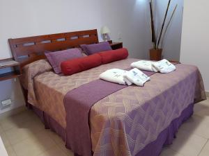 Una cama o camas en una habitación de Apart Agustina
