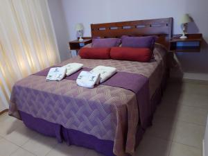 Una cama o camas en una habitación de Apart Agustina