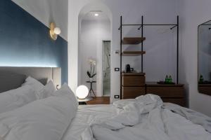 Postel nebo postele na pokoji v ubytování M20 Boutique Hotel