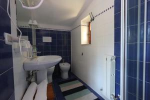 Koupelna v ubytování La Casa sul Blu Albergo Diffuso