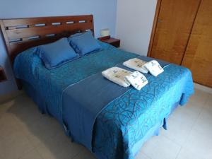 Una cama o camas en una habitación de Apart Agustina