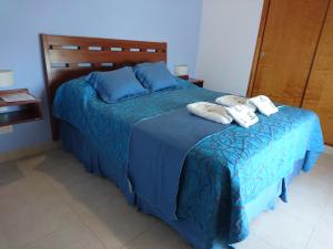 Una cama o camas en una habitación de Apart Agustina