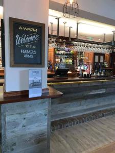 a view of a welcome to the farmers arms bar at The Farmers Arms Inns in Catterick Bridge