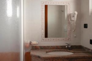 Koupelna v ubytování Hotel B&B Fortuna