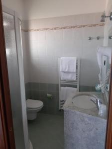 Koupelna v ubytování Hotel B&B Fortuna