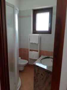 Koupelna v ubytování Hotel B&B Fortuna