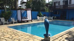 Bazén v ubytování POUSADA BELLA SPIAGGIA nebo v jeho okolí