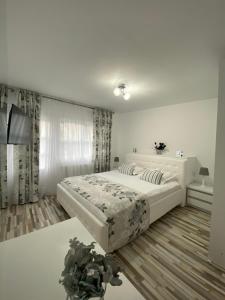 Postel nebo postele na pokoji v ubytování Casa Inna