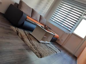 Зона вітальні в Apartman HEDONIJA