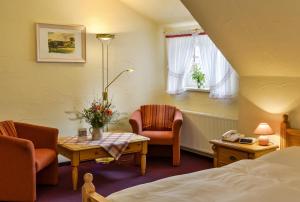 Posezení v ubytování Hotel Gut Voigtlaender