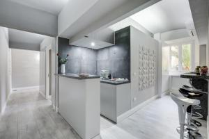 A kitchen or kitchenette at Scipioni Best Rooms