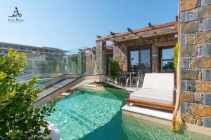 a house with a swimming pool at Avra Maris in Sitia