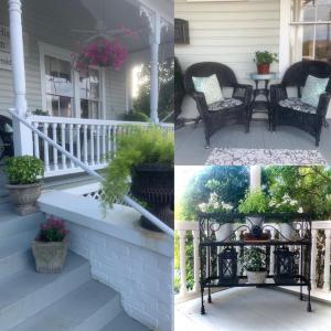 a porch with plants and flowers on it at Trowell Historic Inn in Jesup