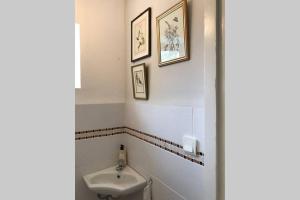 Ванна кімната в Maison La Brenne