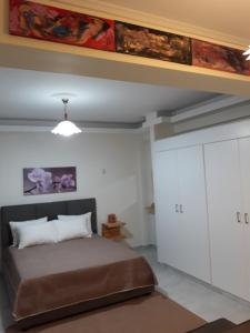 Postel nebo postele na pokoji v ubytování AS ALESIAS SUITES.Room 12.