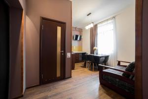TV a/nebo společenská místnost v ubytování Aparthotel Na Mytniy