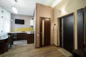 Kuchyň nebo kuchyňský kout v ubytování Aparthotel Na Mytniy