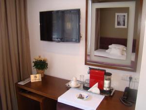 TV a/nebo společenská místnost v ubytování StanGret Hotel