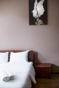 Postel nebo postele na pokoji v ubytování Aparthotel Na Mytniy