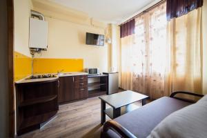 Kuchyň nebo kuchyňský kout v ubytování Aparthotel Na Mytniy