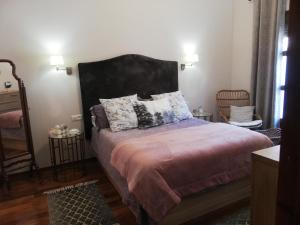 Postel nebo postele na pokoji v ubytování Casa Candela