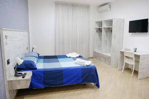 Posteľ alebo postele v izbe v ubytovaní b&b annunziata dream