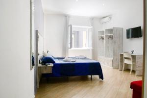 Posteľ alebo postele v izbe v ubytovaní b&b annunziata dream