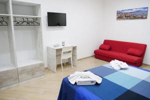 Televízia a/alebo spoločenská miestnosť v ubytovaní b&b annunziata dream