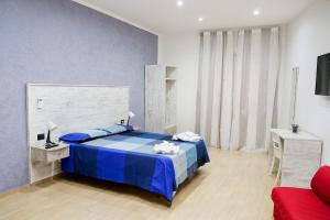 Posteľ alebo postele v izbe v ubytovaní b&b annunziata dream