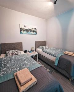 Postel nebo postele na pokoji v ubytování Solarberg Apartment