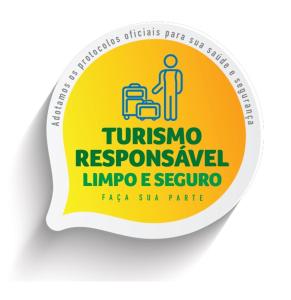 a sticker of a sign that reads tuinmoremoreserved limophone at Vila São Pedro in Ilhabela