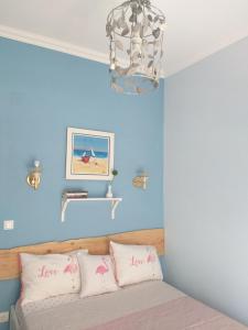 Postel nebo postele na pokoji v ubytování Sea Apartment + 18 fotografií