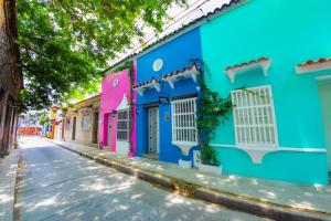 a colorful building on a street in managua at Casa Noir Cartagena in Cartagena de Indias