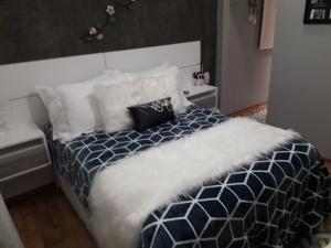 Suíte da Cris em Gramado客房内的一张或多张床位
