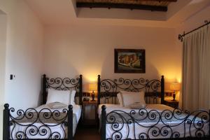 Кровать или кровати в номере Kemerli Konak Boutique Hotel