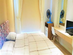 Postel nebo postele na pokoji v ubytování Grand Caribbean resort Pattaya 1 bedroom 4th floor + 18 fotografií