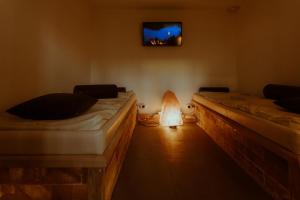Ένα ή περισσότερα κρεβάτια σε δωμάτιο στο Medical and Spa Centre Merkur