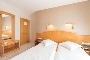 Letto o letti in una camera di Hotel Re'ser Stuff