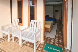 Posezení v ubytování Pesona Wisata Alam Ciparay Endah Mitra RedDoorz + 7 fotografií