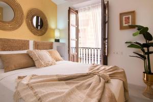 Posteľ alebo postele v izbe v ubytovaní Riad Alhambra