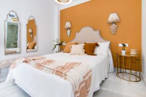 Ліжко або ліжка в номері Riad Alhambra