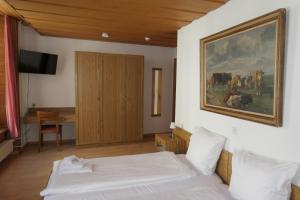 Voodi või voodid majutusasutuse Hotel Franziskaner toas