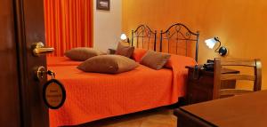 Postel nebo postele na pokoji v ubytování Hotel Neapolis