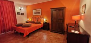 Postel nebo postele na pokoji v ubytování Hotel Neapolis