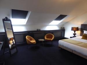 Rúm í herbergi á B in Antwerp